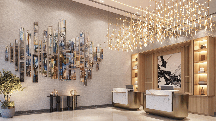 Image of lobby with reception desk and lights on the ceiling at Ramada Encore by Wyndham Gurugram Dwarka Expressway